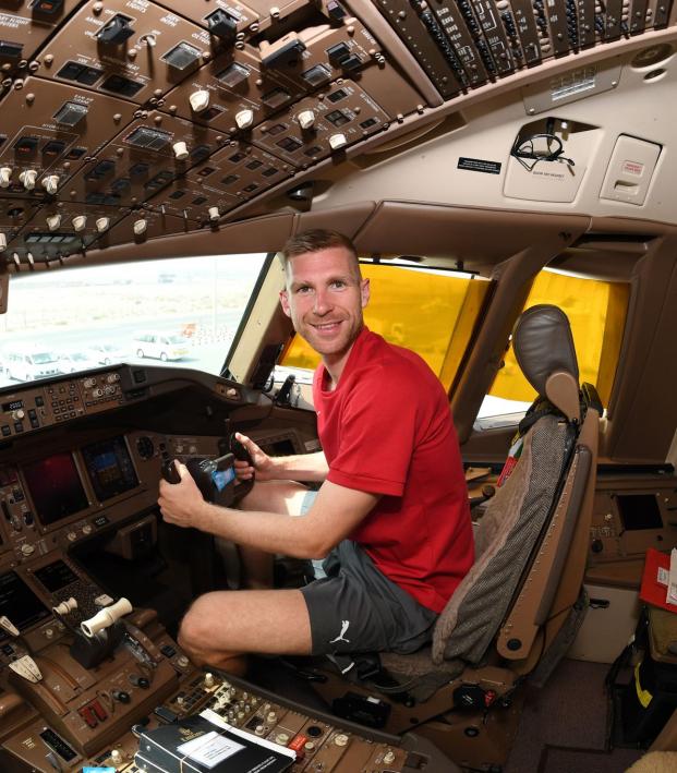 Per Mertesacker Pilots An Airplane