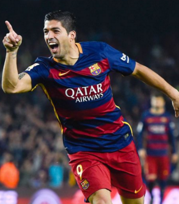 Luis Suarez celebrates his first goal for Barcelona 