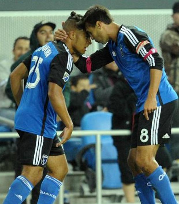 Quincy Amarikwa celebrates his goal with fellow forward, Chris Wondolowski.