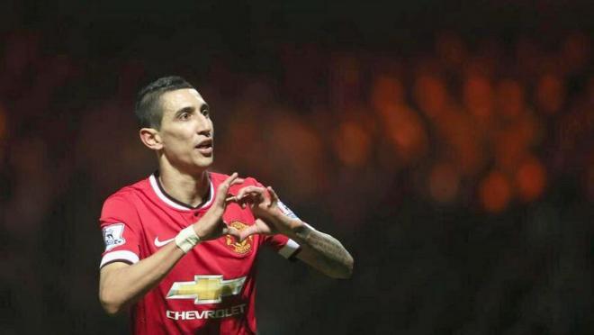 Di Maria holding up his signature heart sign. 