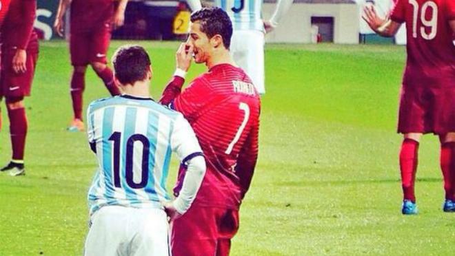 ronaldo and messi chatting it up.