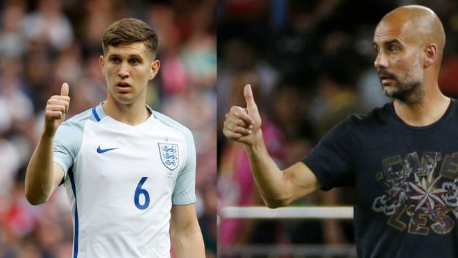 Pep Guardiola and John Stones