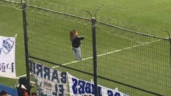 Child on fence