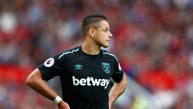 Chicharito stands, looking disappointed during his West Ham debut