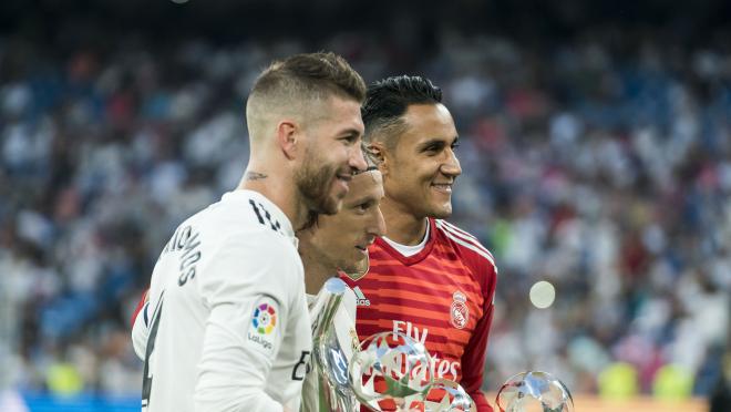 Sergio Ramos, Luka Modric and Keylor Navas of Real Madrid pose with their 2017/18 UEFA Men's Defender, Player of the Year and Goalkeeper of the year awards respectively