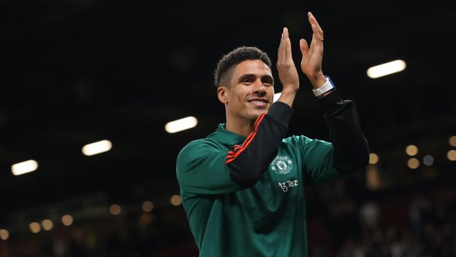 Raphaël Varane applauds fans at Old Trafford