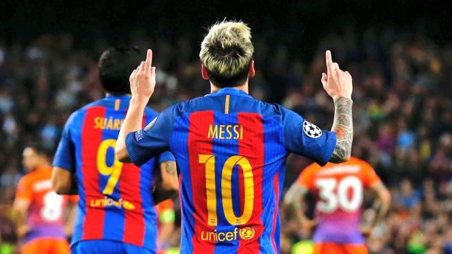 Messi celebrates after scoring the winner against Valencia.