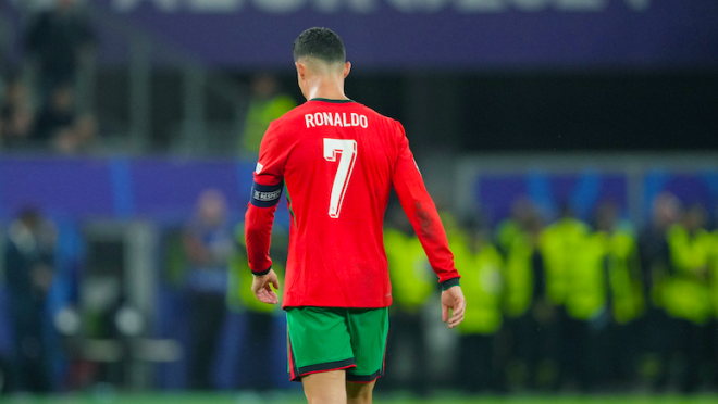 Portugal's Cristiano Ronaldo walks across the pitch in Euro 2024 quarterfinal against France