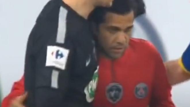 Dani Alves embraced by teammate