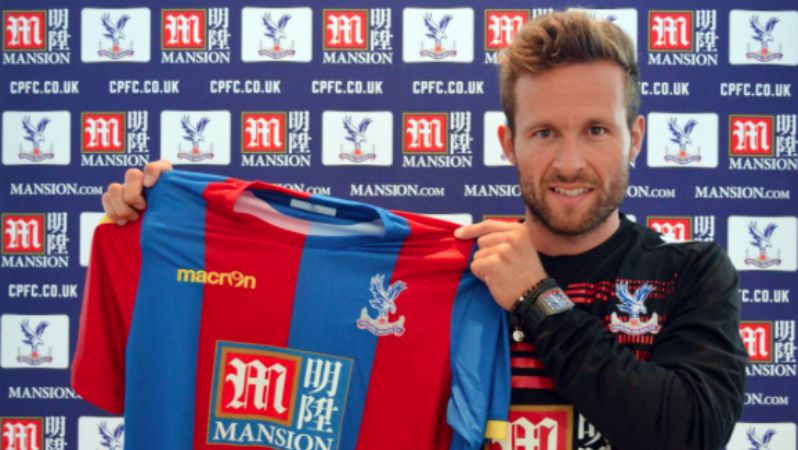 Johan Cabaye is shown holding a Crystal Palace jersey. 